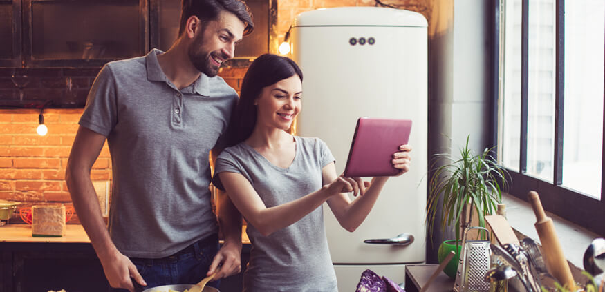 Young Couple browsing on a tablet